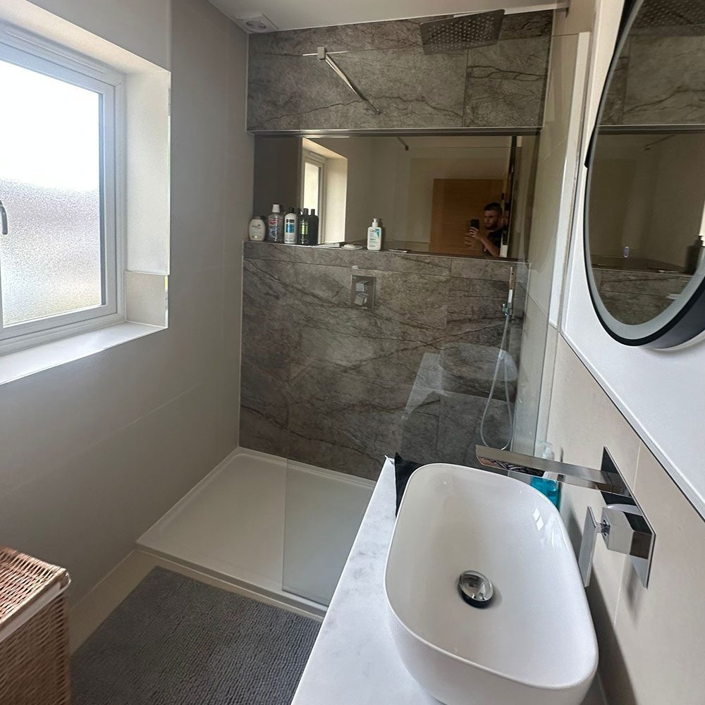 Bathroom refurbishment in progress with a new basin fitted